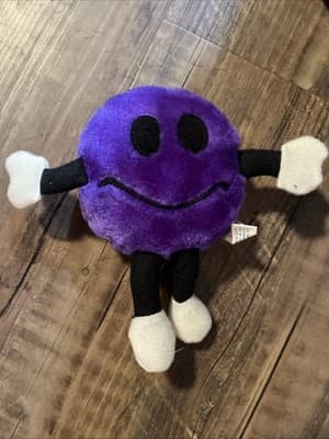6" Smiley Face Plush Purple with loop for hanging - Image 1