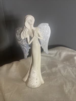 Elegant Angel Figurine with Embossed Wings Design - Image 1