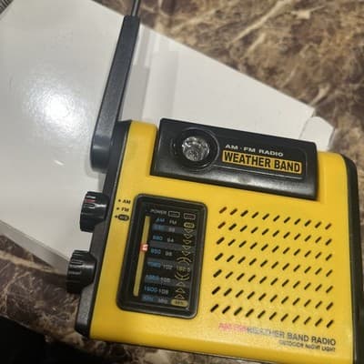 Vintage AM/FM Weather Band Radio with Pivoting LED Light -sealed in package - Image 1