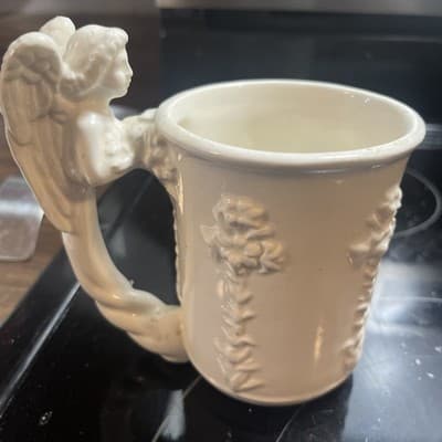 Vintage 1994 McConnell Talus Corp White Angel Handle Lily Motif Coffee Mug Cup - Image 1