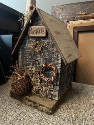 Detailed Handmade Birdhouse With Woven Baskets And A Cardinal On Top - Image 1