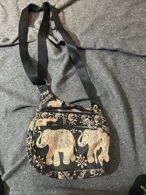 Vintage women’s Crossbody Purse Black With Cream Elephants And Two Front Zippers - Image 1