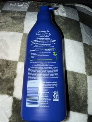 NIVEA Nourishing Skin Firming Body Lotion with Q10 and Vitamin C, Dry Skin - Image 1