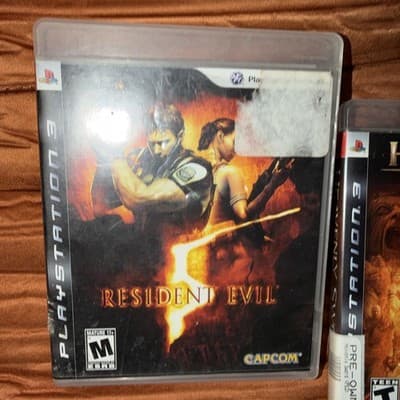 Resident Evil 5, Batman Arkham City, BorderLands Game bundle Sony PlayStation 3 - Thumbnail 2