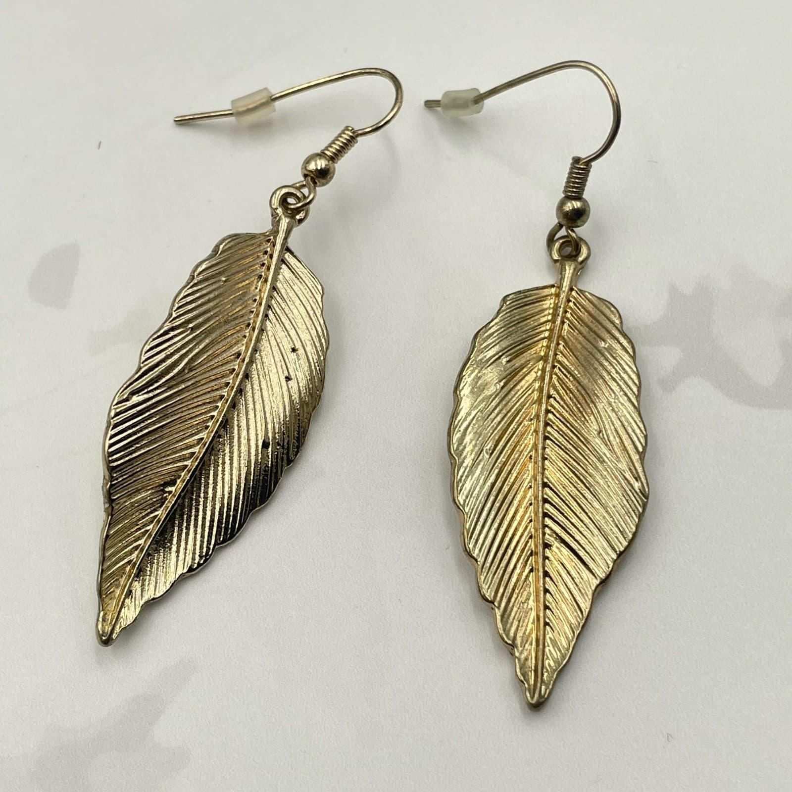 Vintage Gold Tone Leaf Feather Dangle Earrings Long Hook Lightweight Boho Hippie - Image 1