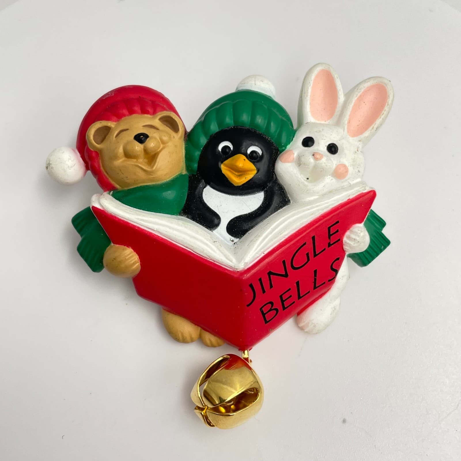 Vintage 90s Hallmark Christmas Jingle Bells Bear Penguin Bunny Book Brooch Pin - Image 1