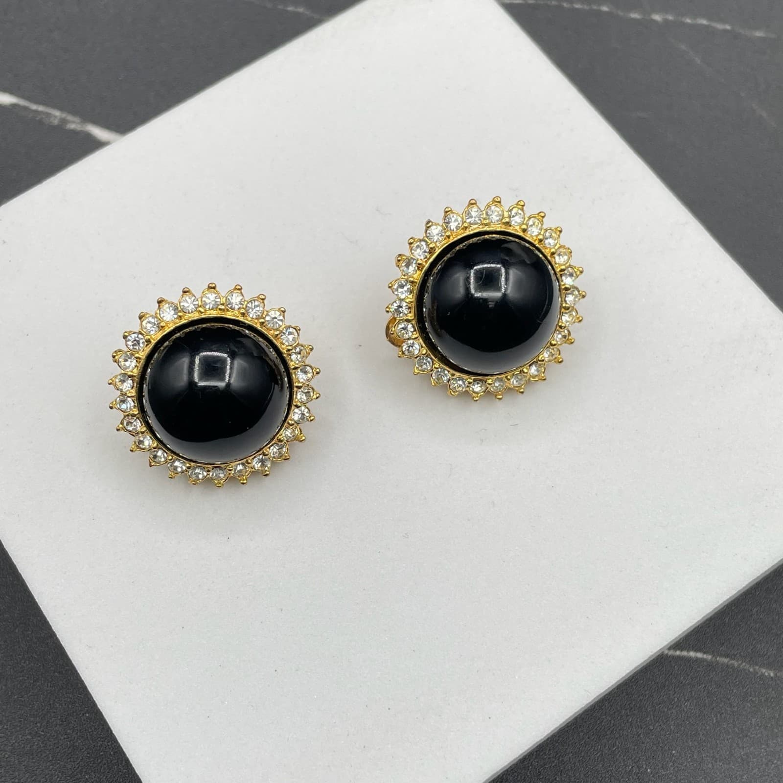Gold-Tone Floral Rhinestone Embellished Black Onyx Round Stud Clip-On Earrings - Image 1