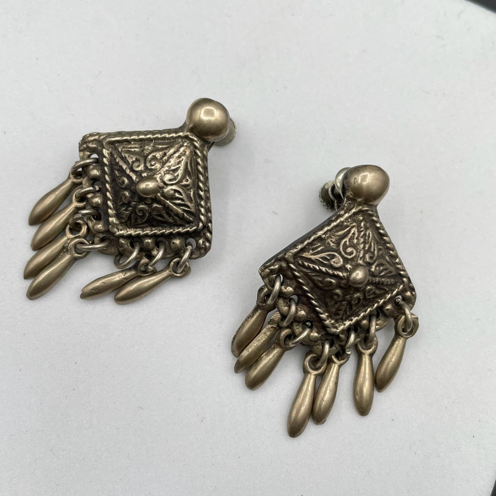 Vintage Brass-Tone Tribal Filigree Art Fringe Hem Dangle Screw Back Earrings - Image 1