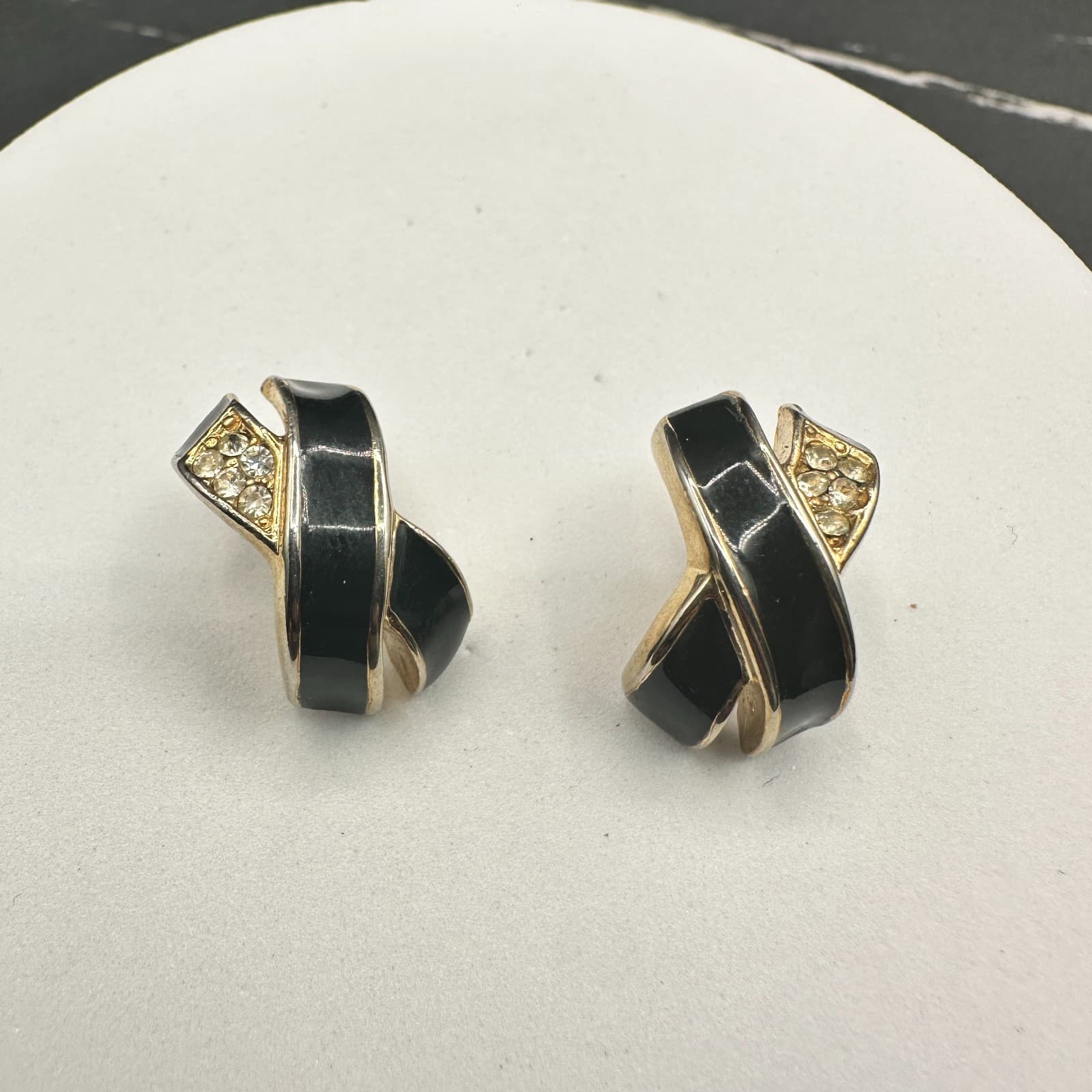 Vintage 80s Black Enamel Clear Rhinestone X Clip-on Earrings Gold Tone Jewelry - Image 1