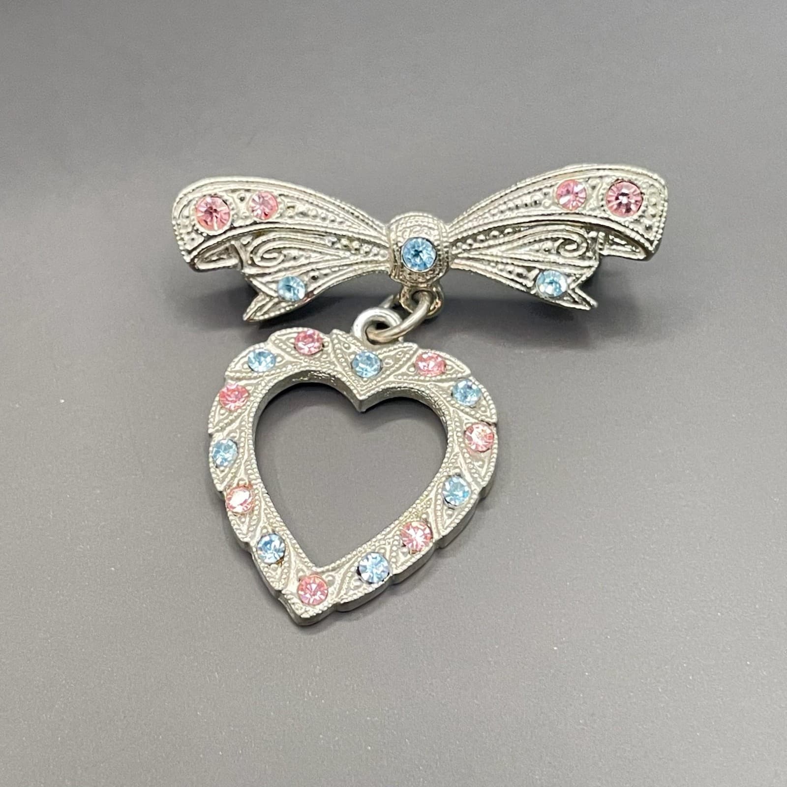 Vintage Rhinestone Bow Dangle Clear Heart Brooch Pin Silver Tone Unsigned - Image 1
