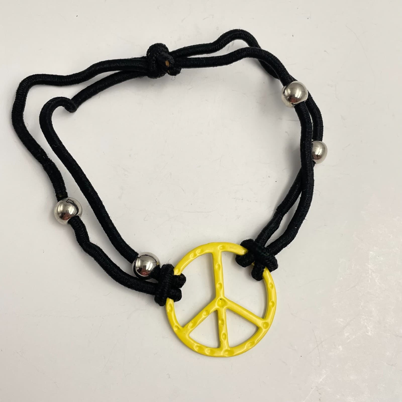 Vintage Y2K Silver Tone Beaded Yellow Charm Peace Sign Bracelet Black Cord - Image 1