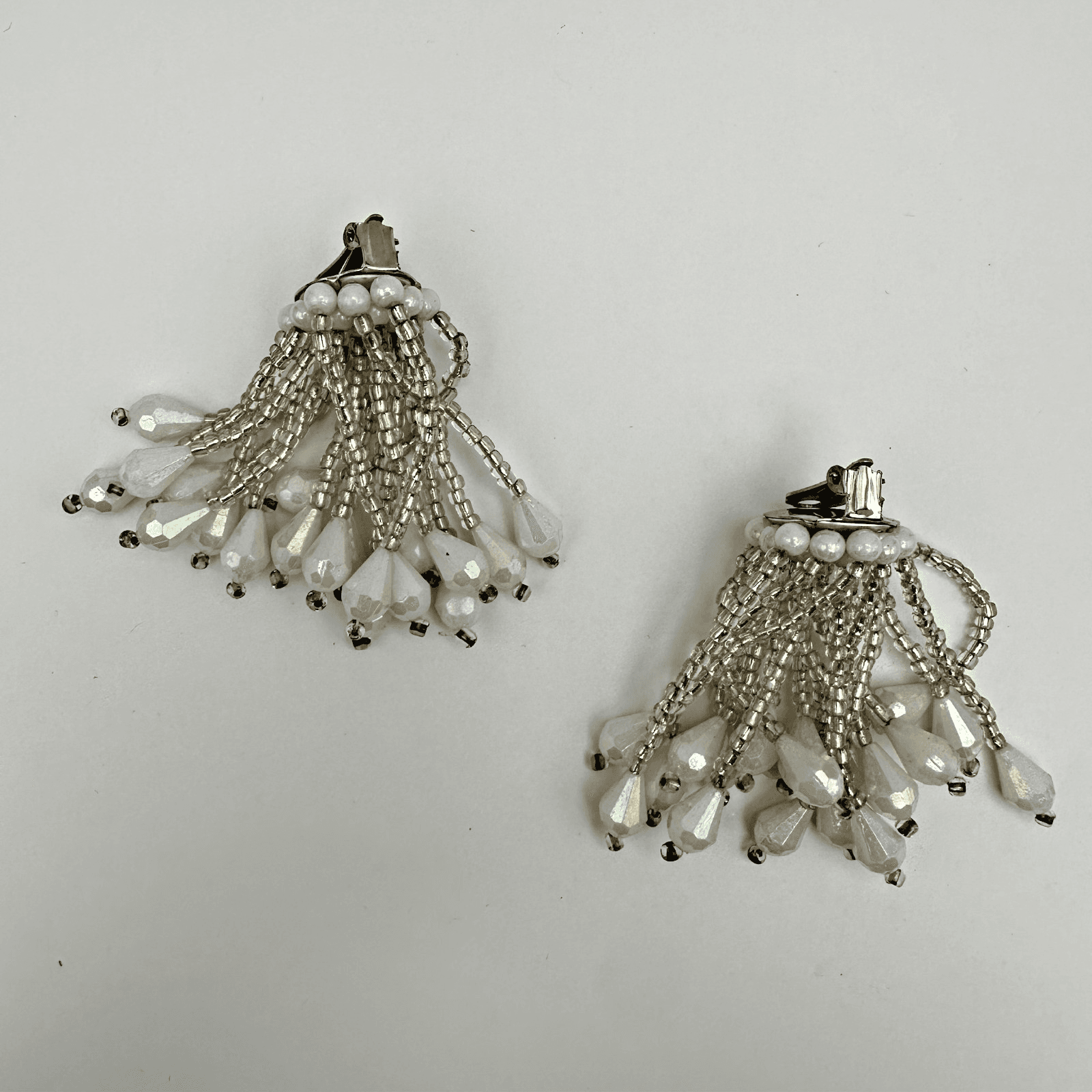 Vintage 80s shimmering white iridescent teardrop cluster clip-on earring Jewelry - Image 1