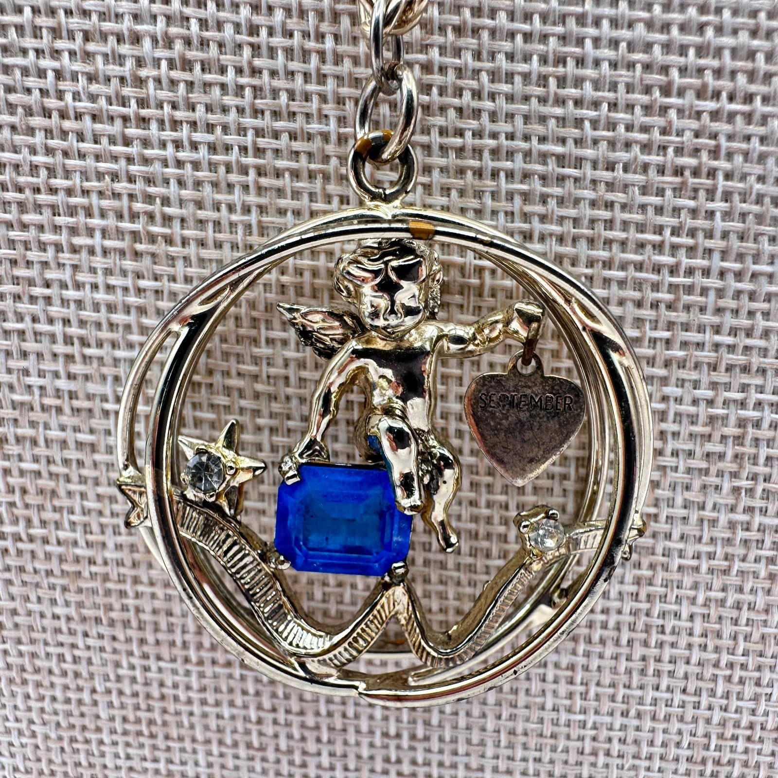 Vintage 80s September Birthstone Angel Pendant Necklace Blue Crystal Charm Gold - Image 1