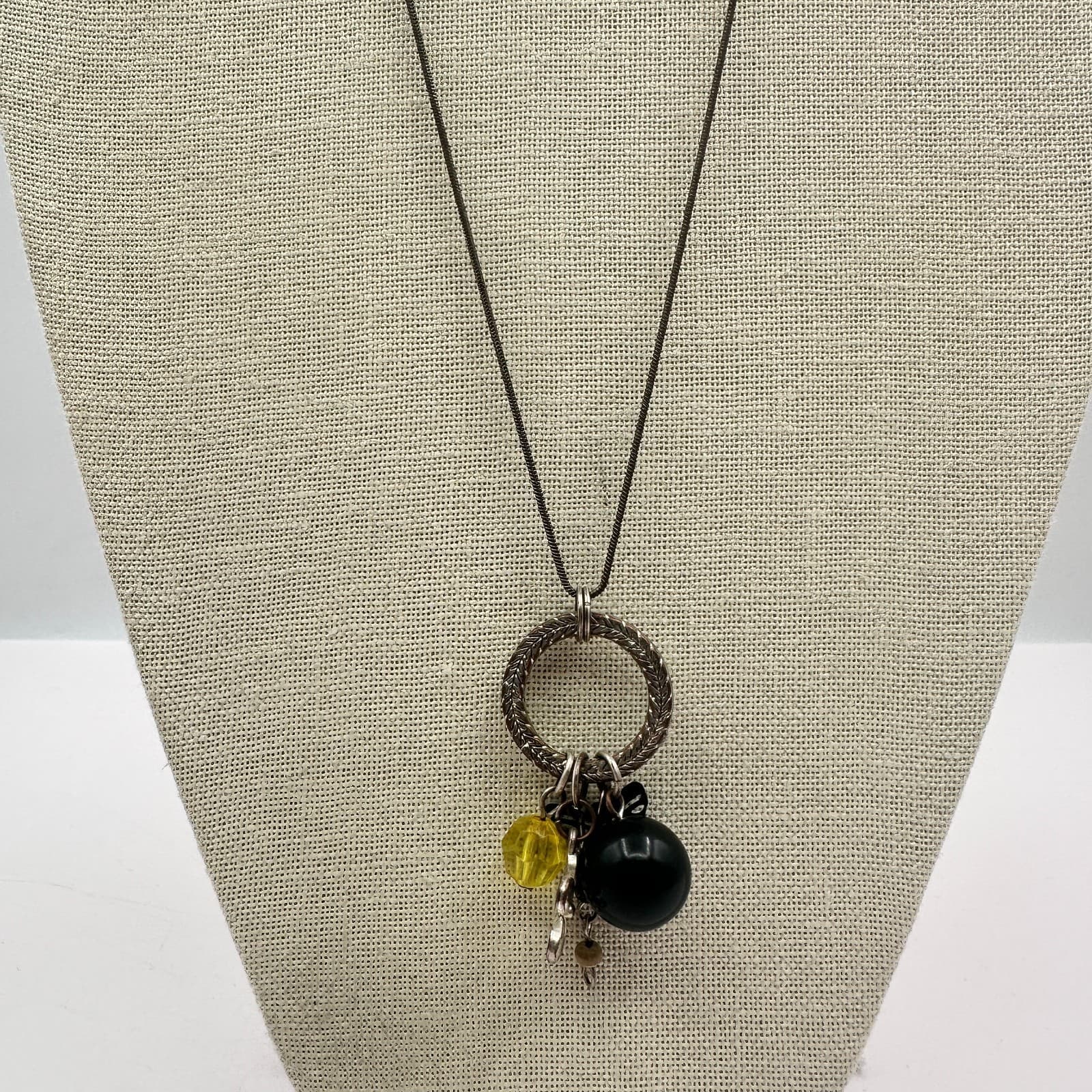 Vintage 60s Necklace Featuring Textured Silver Tone Ring Charm Dangle Jewelry - Thumbnail 2