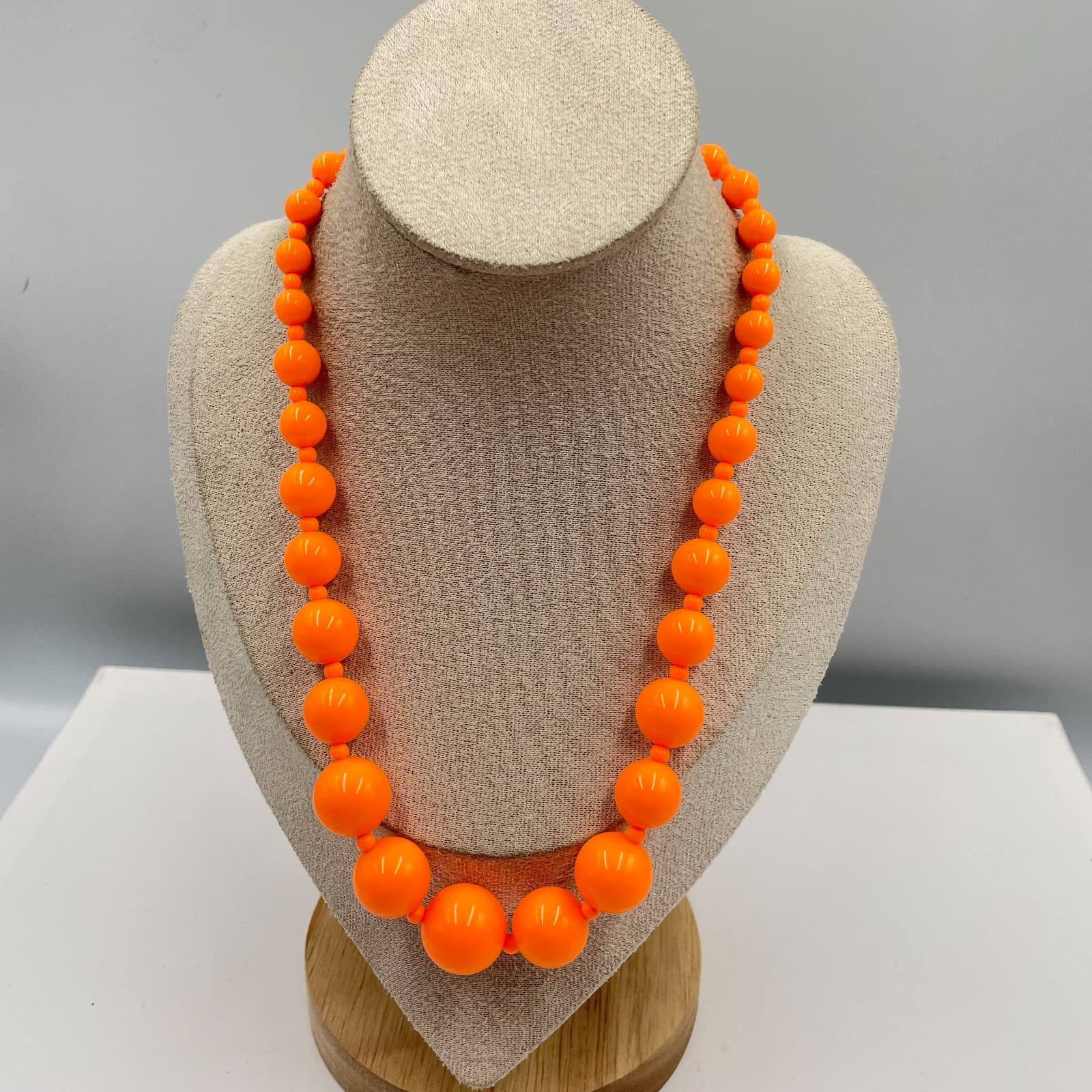 Claire's Silver-Tone Adjustable Neon Orange Graduated Beads Statement Necklace - Image 1