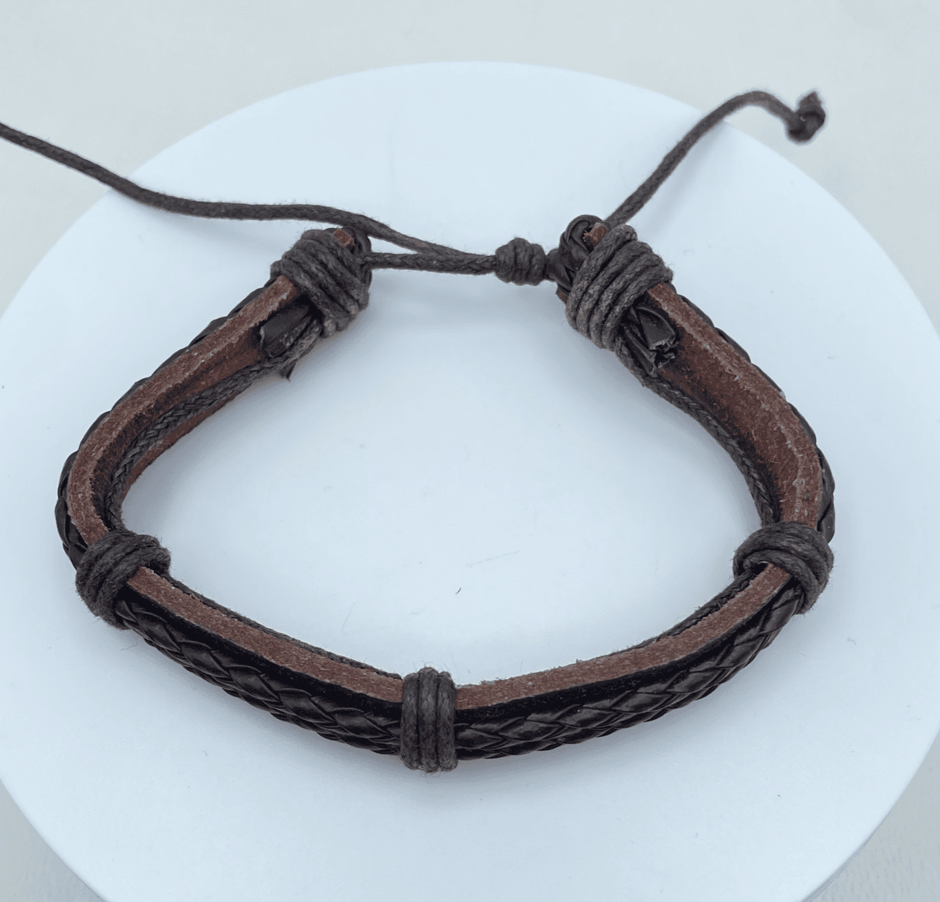 Contemporary Rustic Adjustable Brown Leather Braided Cords Slip Tie Bracelet - Image 1
