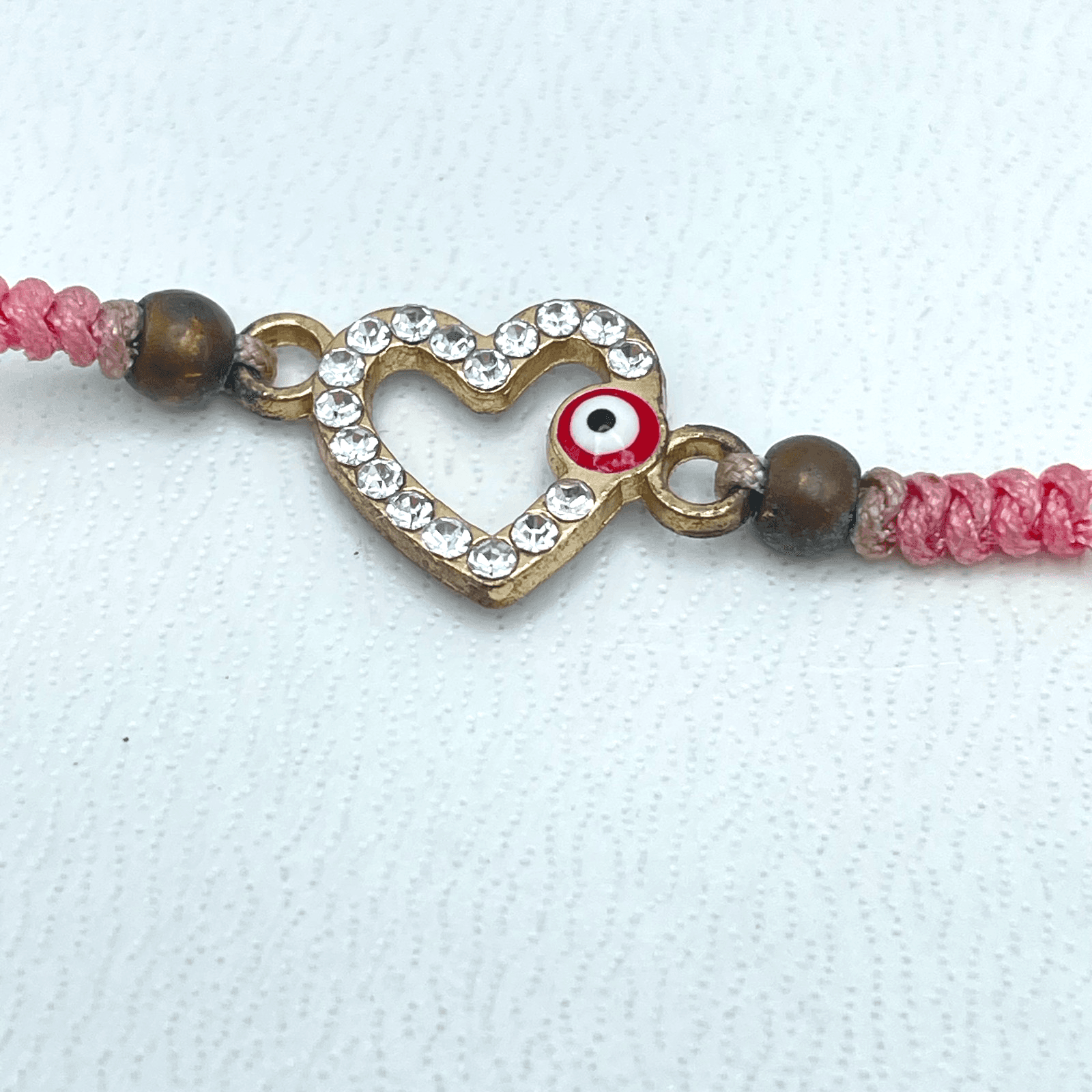 Y2K Adjustable Rhinestone Embellish Evil Eye Pink Cord Heart Charm Bracelet - Image 1
