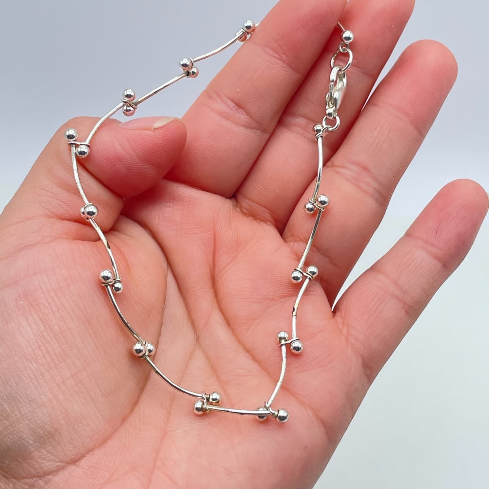 Contemporary Silver-Tone Classic Curved Dainty Bars Ball Link Lobster Bracelet - Image 1