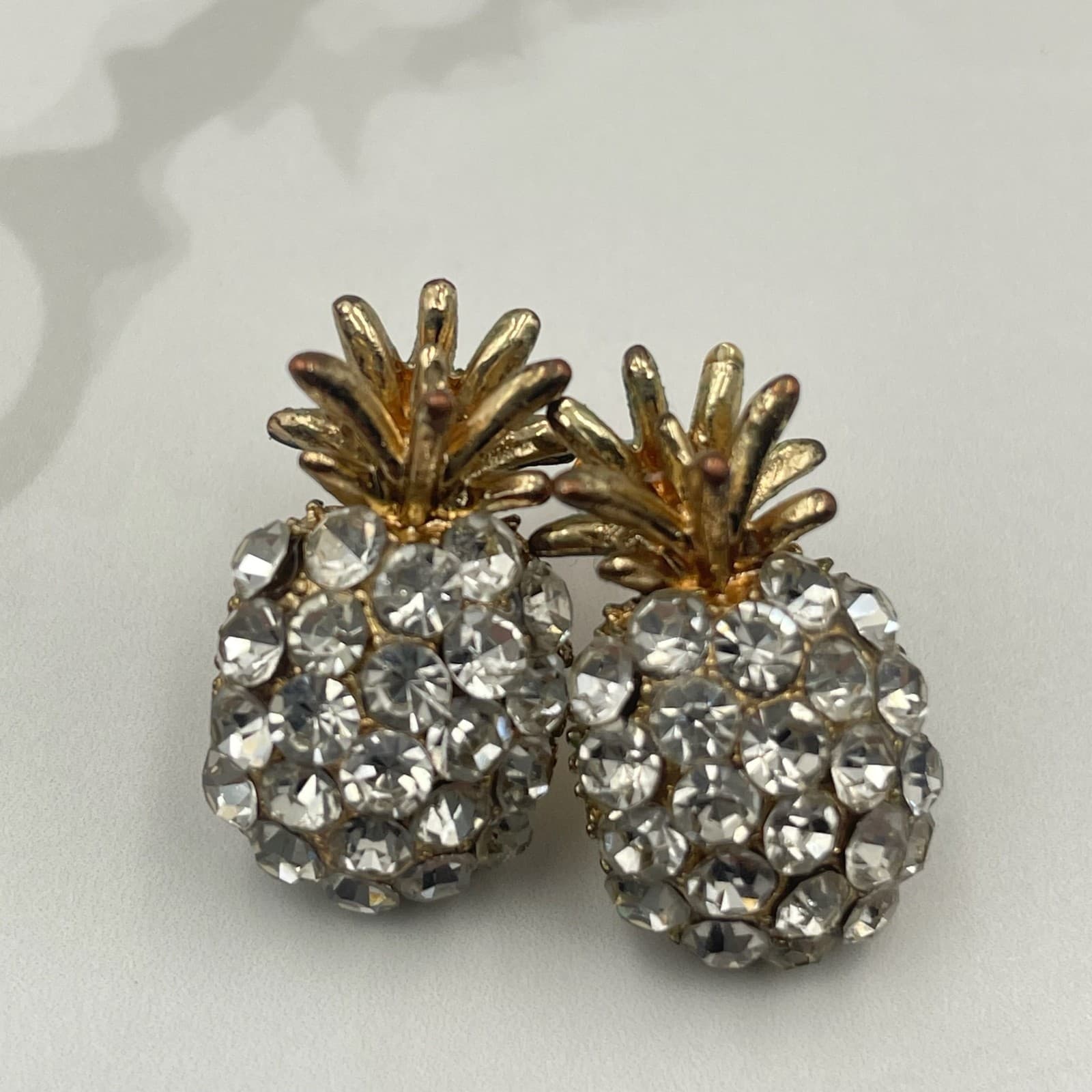 Vintage VTG Pineapple Stud Earrings Clear Rhinestone Gold Tone Pave Fruit - Image 1