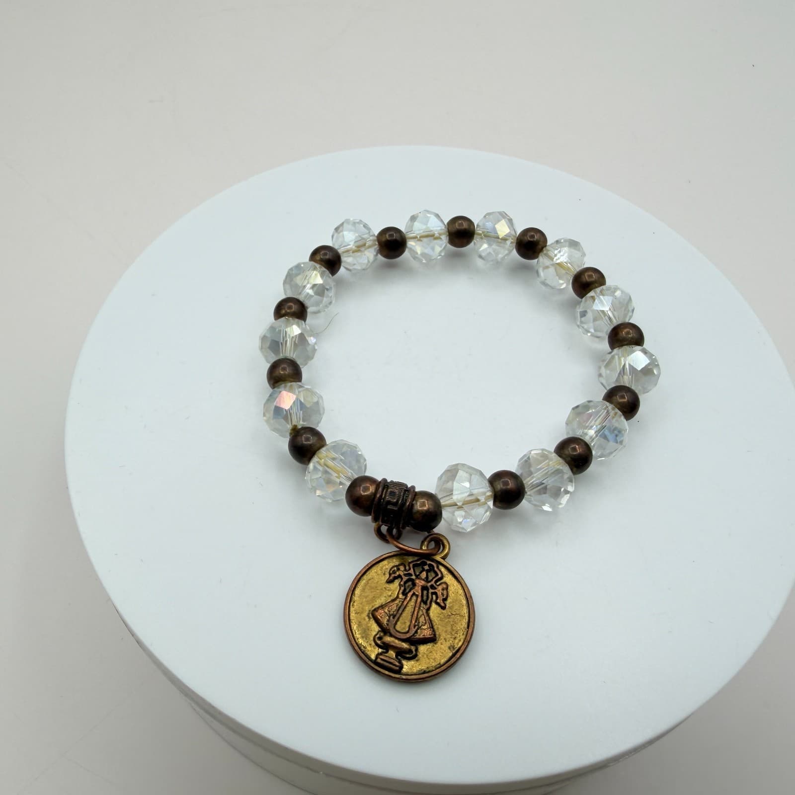 Vintage 80s Clear Beaded Stretch Bracelet Bronze Saint Medal Charm Retro Jewelry - Image 1