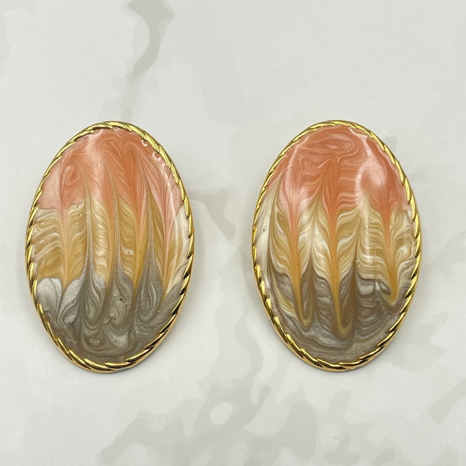 Vintage VTG Swirl Enamel Gold Tone Clip-On Earrings Peach Brown Cream Oval - Image 1