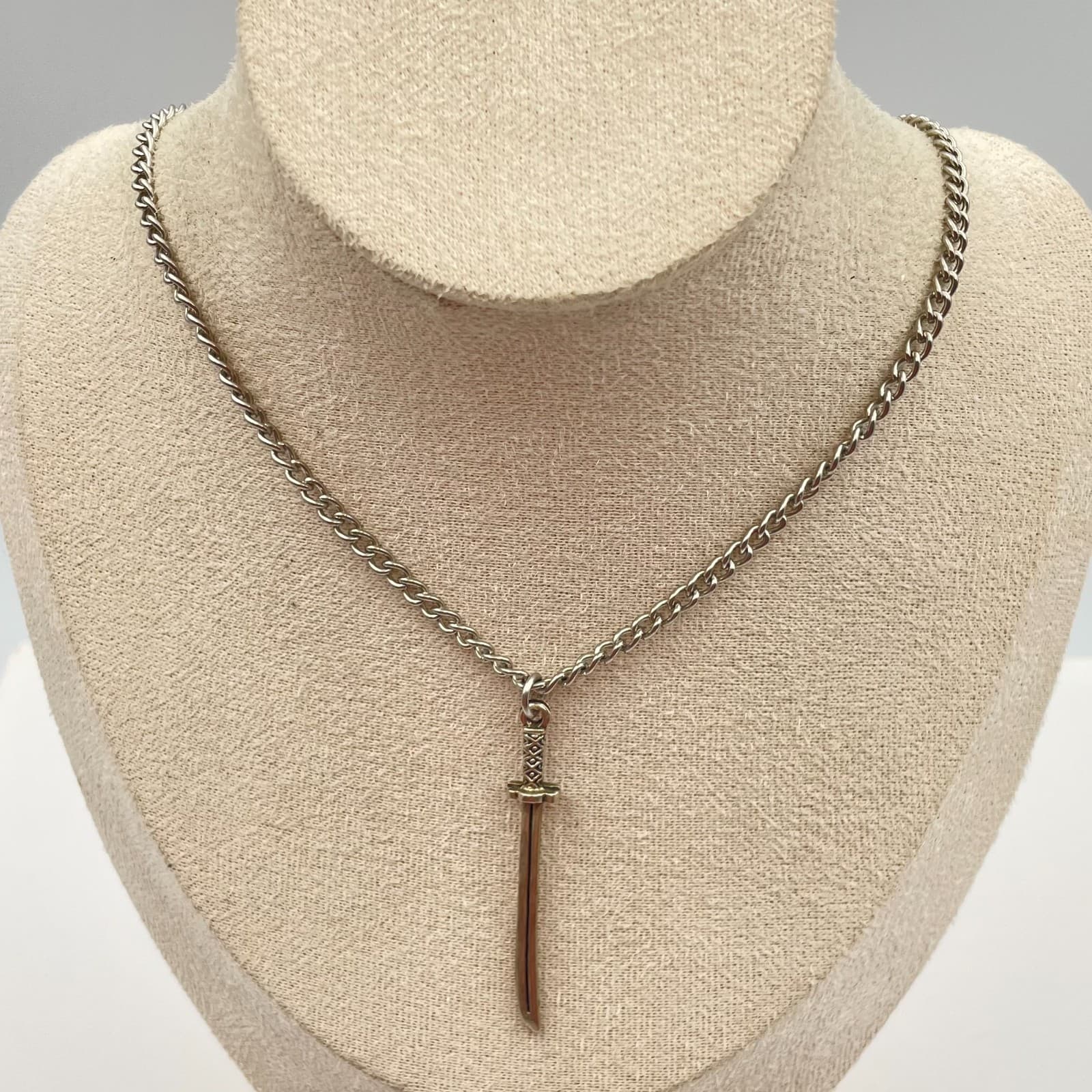 Vintage 80s Gothic Sword Dagger Pendant Necklace Punk Silver Gold Tone Jewelry - Image 1