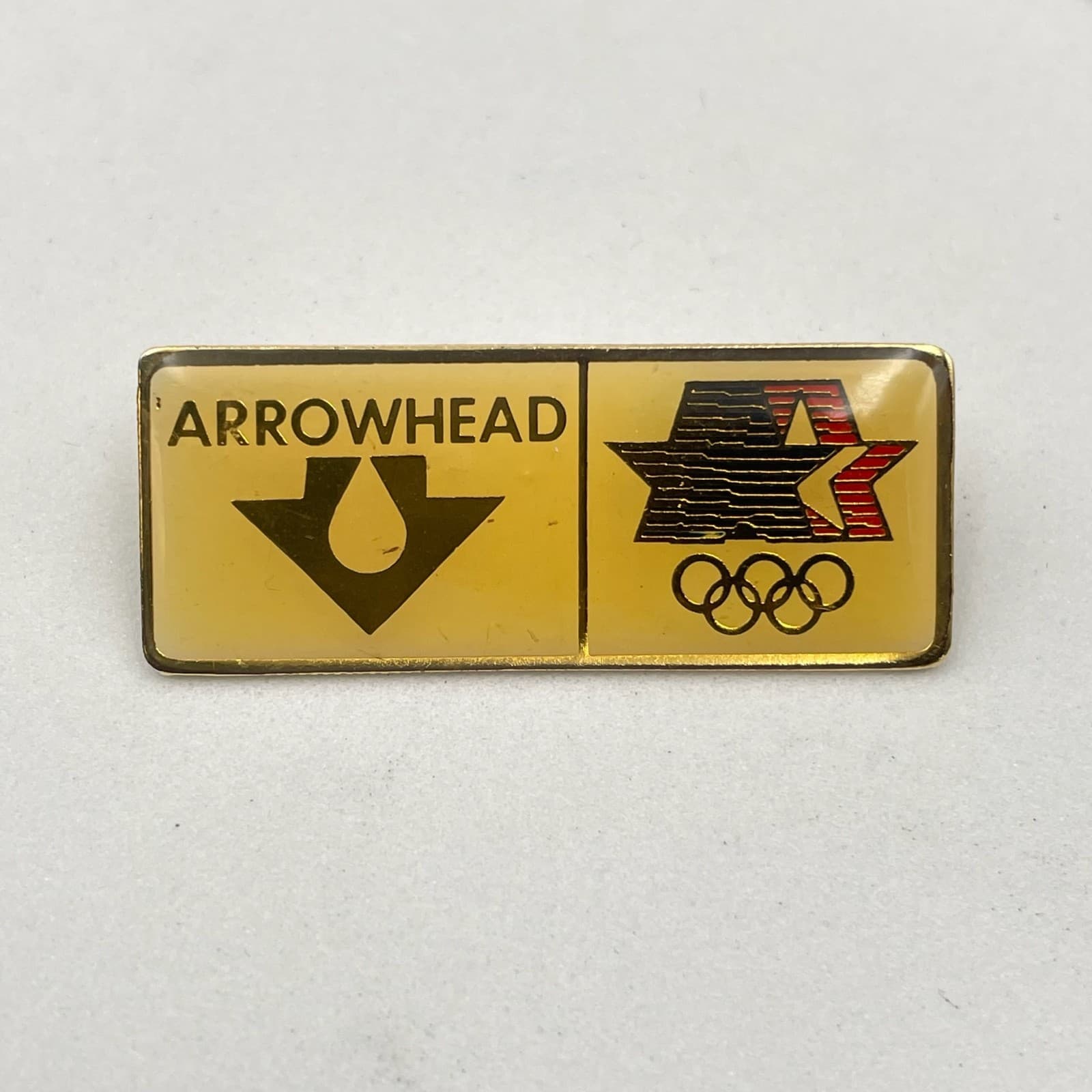 Vintage 1980 LAOLY Arco Olympics Classic Gold-Tone Arrowhead Water Lapel Pin - Image 1