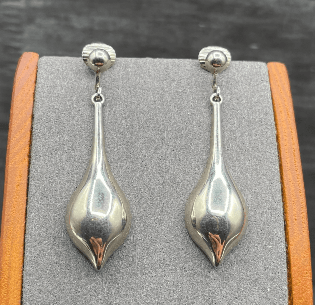 Sleek Modern Silver-Tone Teardrop Dangle Earrings - Image 1