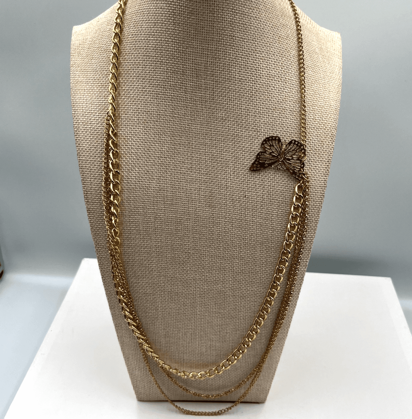 Gold-Tone Curb Chain Multi-Layered Decorative Butterfly Charm Lobster Necklace - Image 1