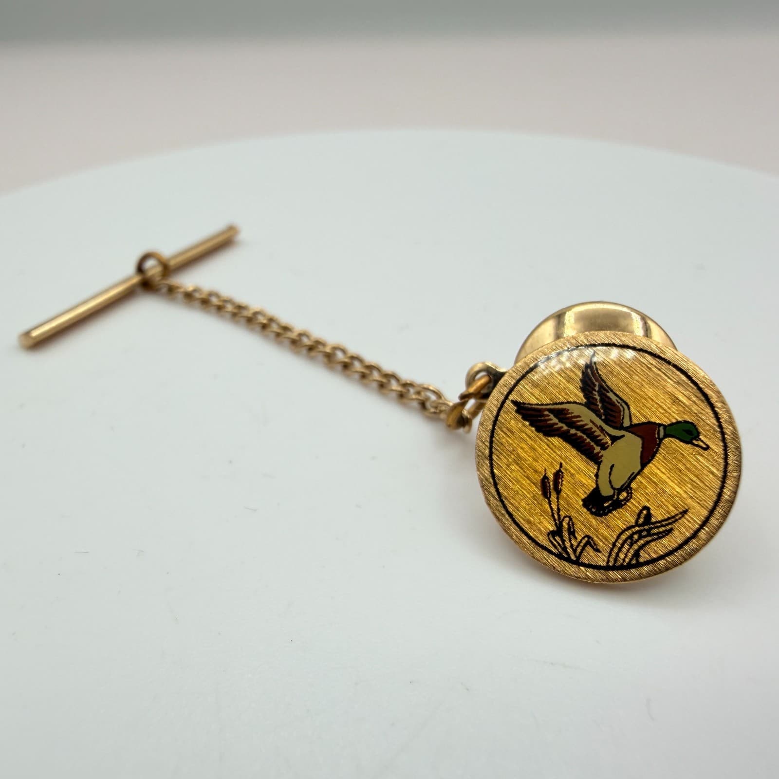 Vintage 80s Gold Tone Flying Duck Enamel Tie Tack Pin with Safety Chain Retro - Image 1