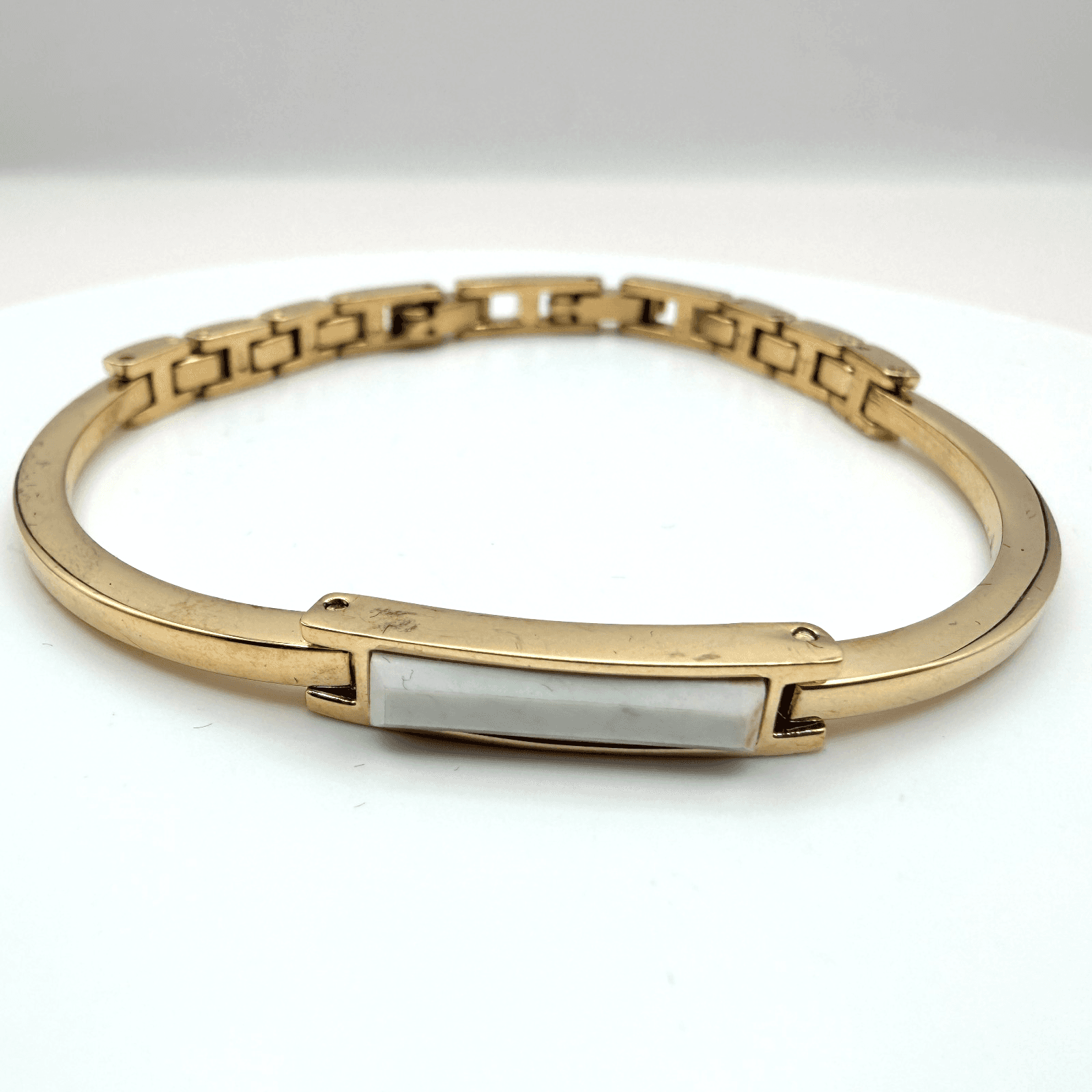 Vintage 80s Gold Tone Textured Spiral Knot Hinged Bangle Bracelet Boho Jewelry - Image 1
