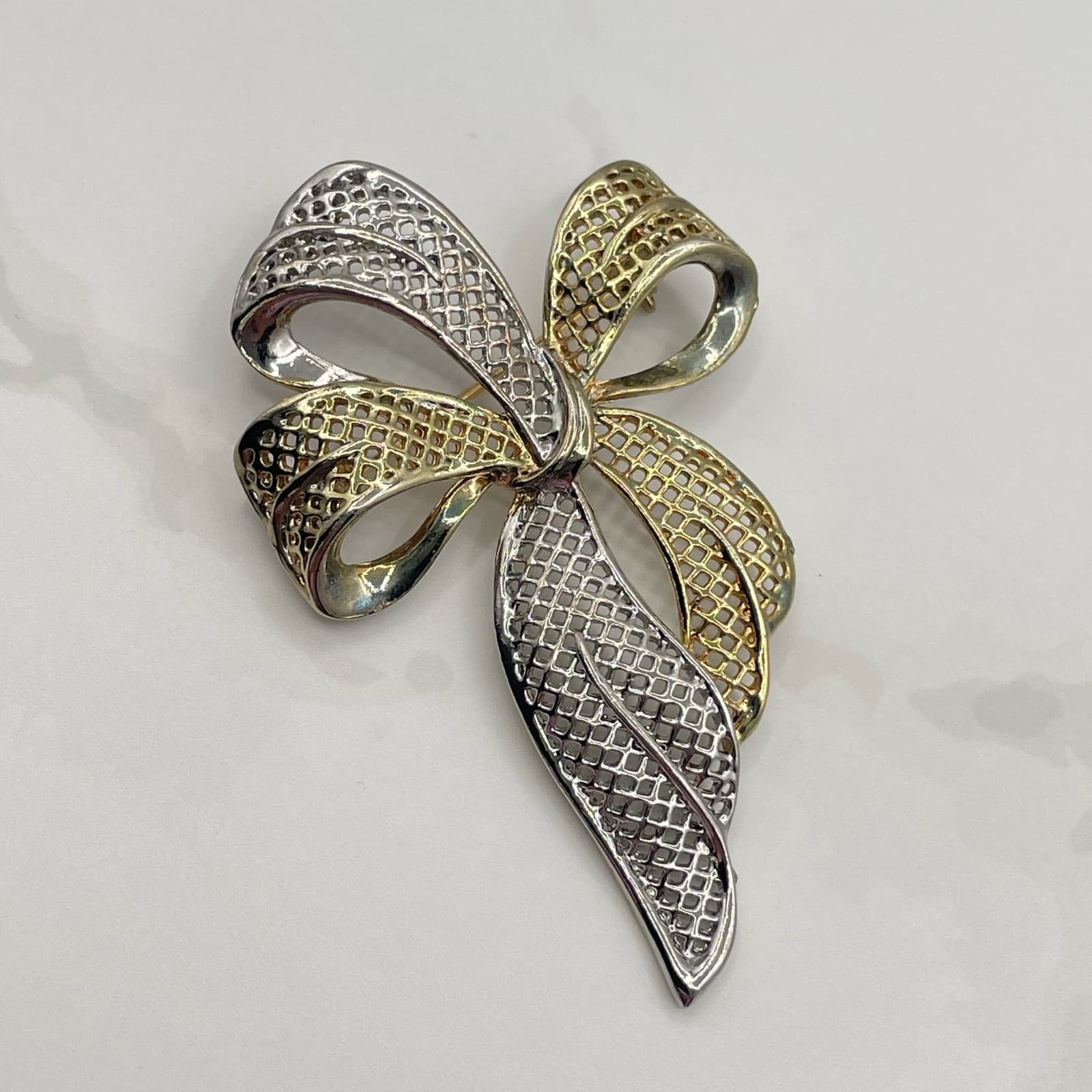 Vintage Two Tone Bow Brooch Pin Gold Silver Filigree Ribbon Open Mesh 3D Style - Image 1