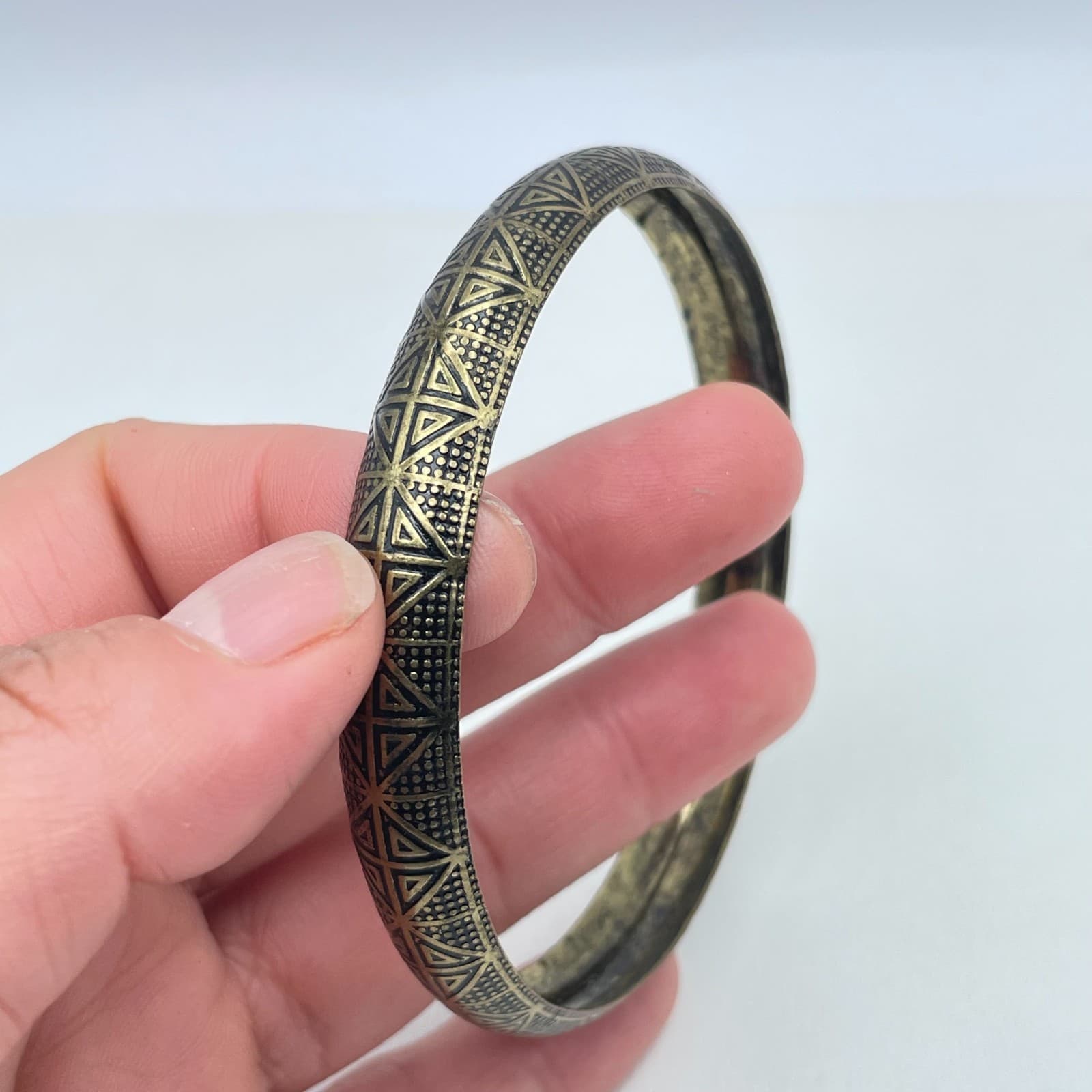 Vintage Brass-Tone Tribal Engraved Oxidized Metal Geometric Bangle Bracelet - Image 1