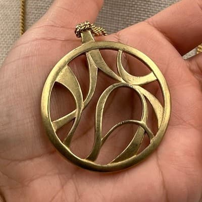 Vintage Gold Tone Abstract Swirl Pendant Necklace Large Round Cutout Statement - Image 1