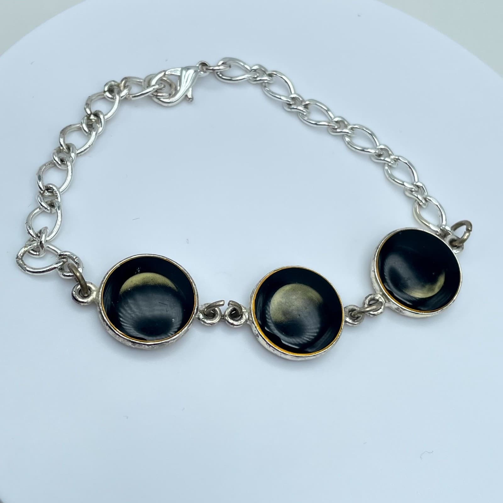 Silver-Tone Curb Link Chain Lunar Cycle Solar Eclipse Medallion Lobster Bracelet - Image 1