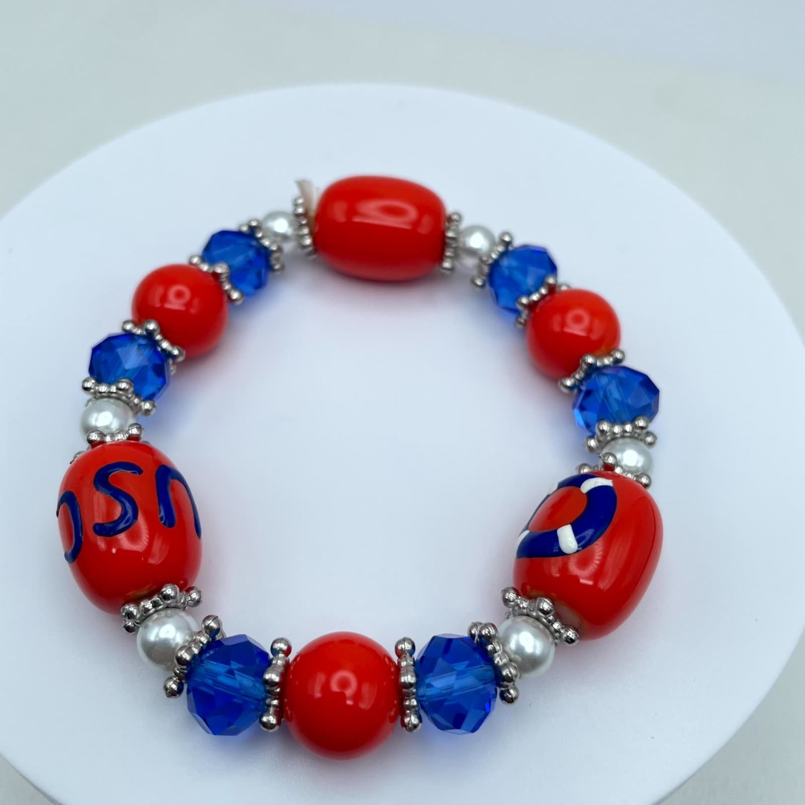 Souvenir Silver-Tone US Coast Guard Red Blue Faceted Glass Bead Stretch Bracelet - Image 1