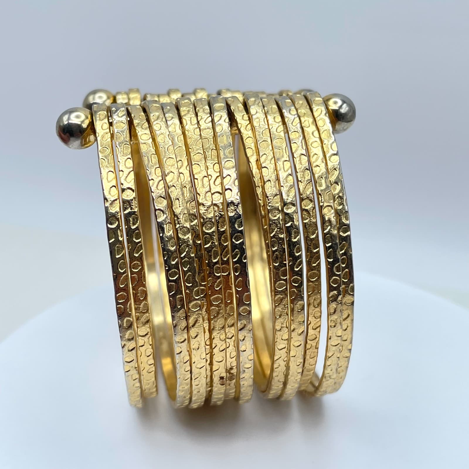 Gladiator-Style Gold Tone Wide Multi-Band Stacked Hammered Open Cuff Bracelet - Image 1