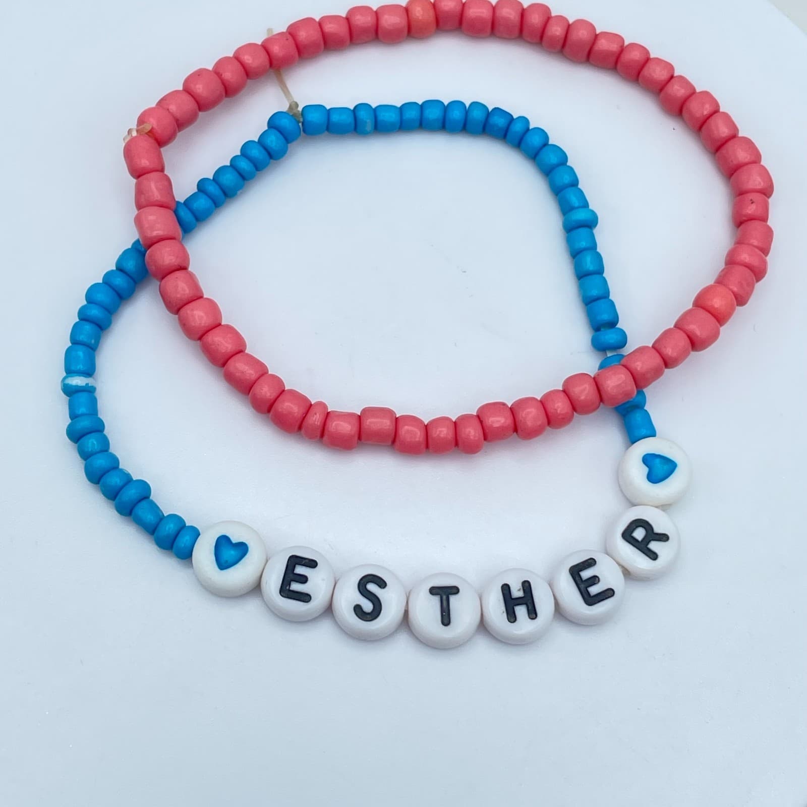 Lot of 2 Pink Blue Seed Beaded Personalized Name "Esther" Cord Stretch Bracelet - Image 1