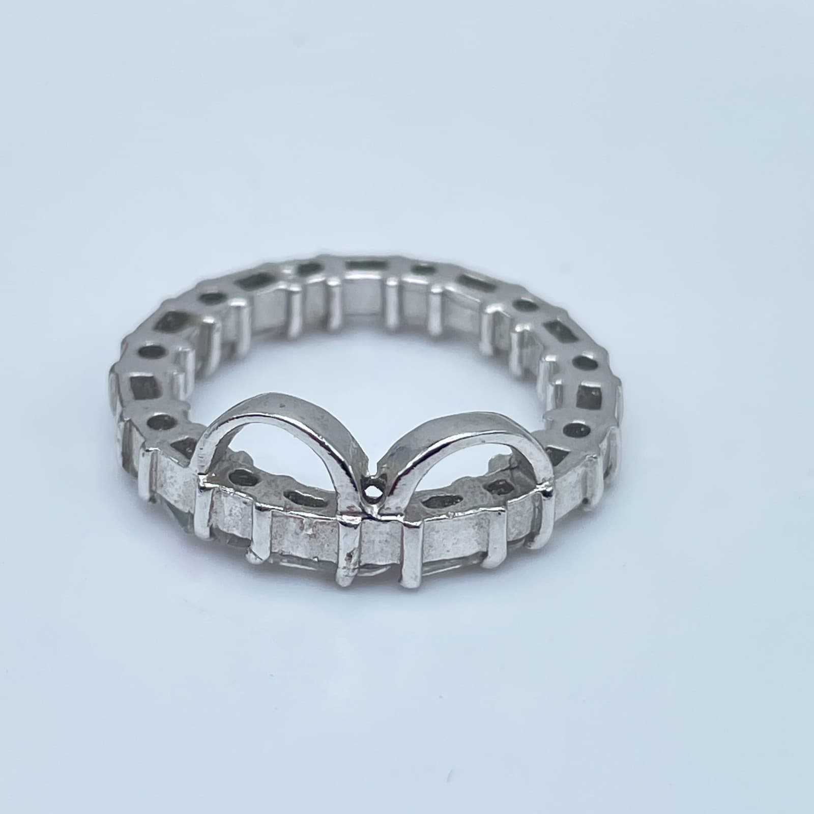 Classic Silver-Tone Engraved Cut-Out Metal Bow Motif Eternity-Style Band Ring - Image 1