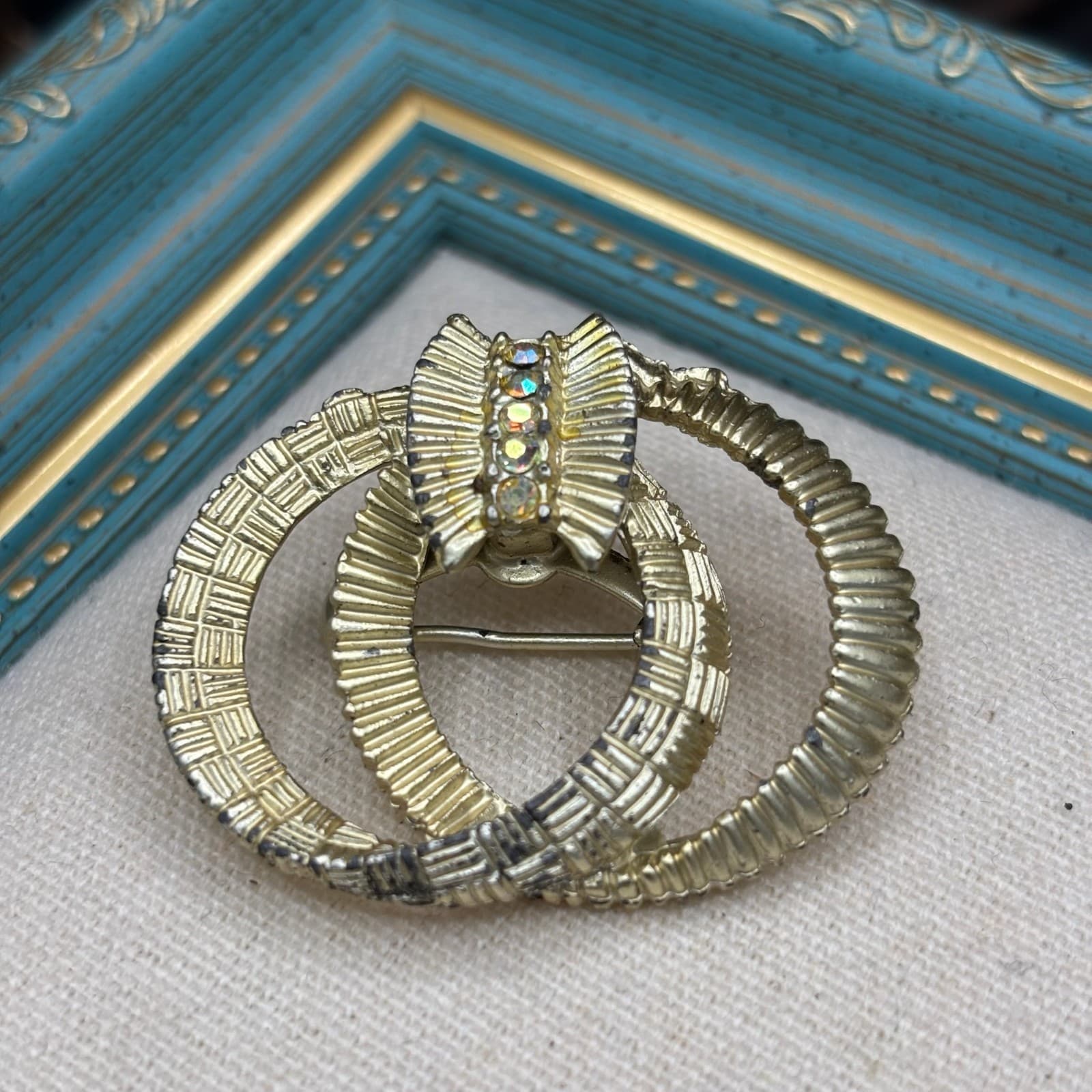 Vintage Gold Tone Brooch Interlocking Circles Textured Pin AB Rhinestone - Image 1