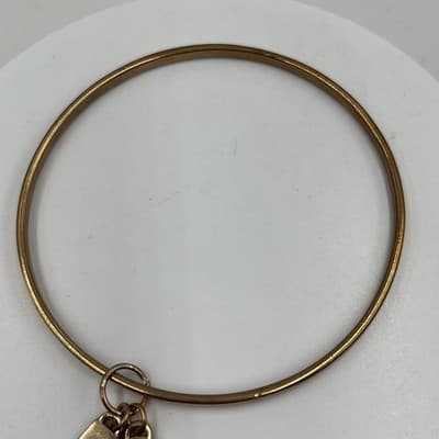 Vintage OPI Gold Tone Bangle Bracelet with Nail Polish Bottle & Logo Disc Charms - Thumbnail 2