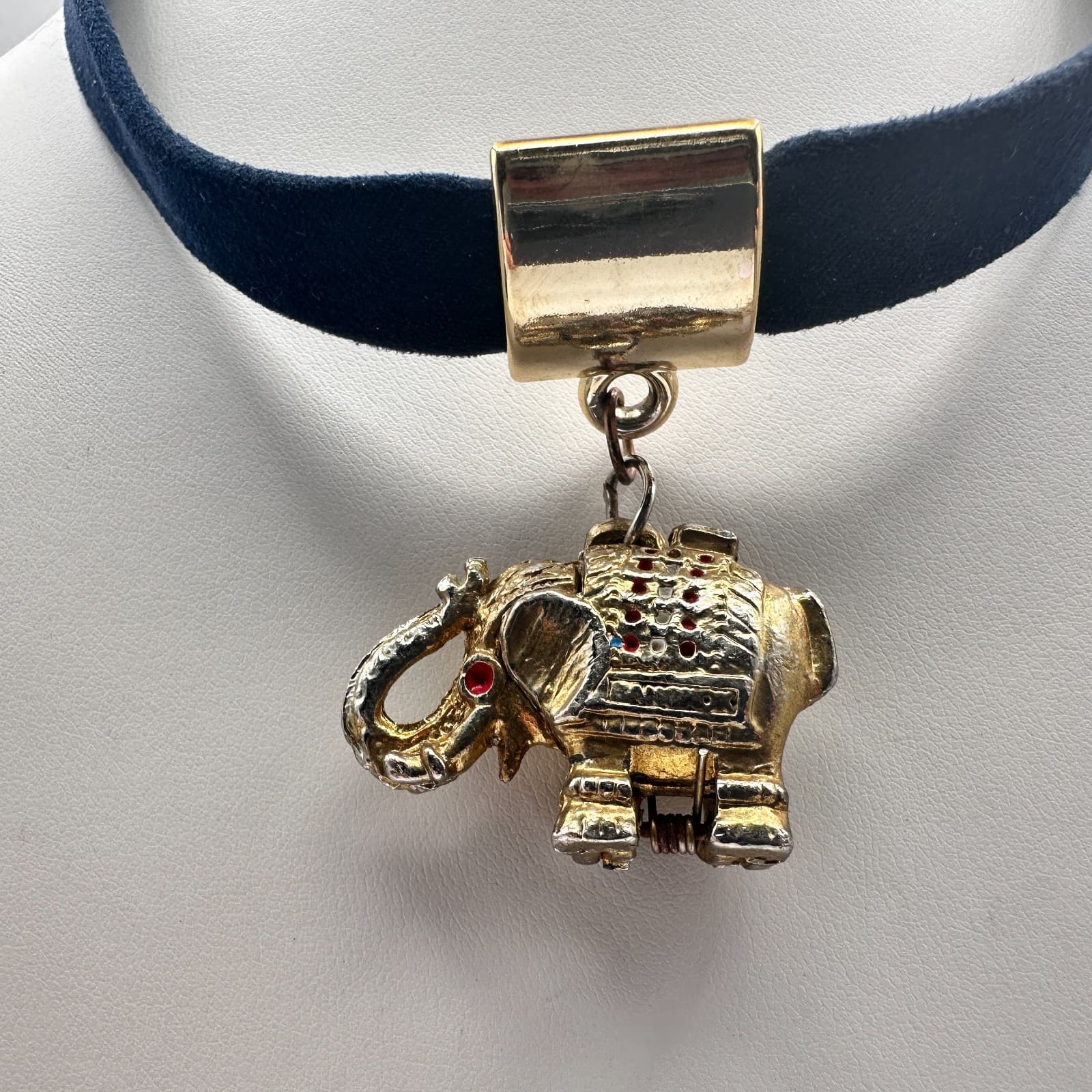 Vintage 90s Gold Tone Elephant Choker Necklace Red Crystal Eye Black Suede Cord - Image 1