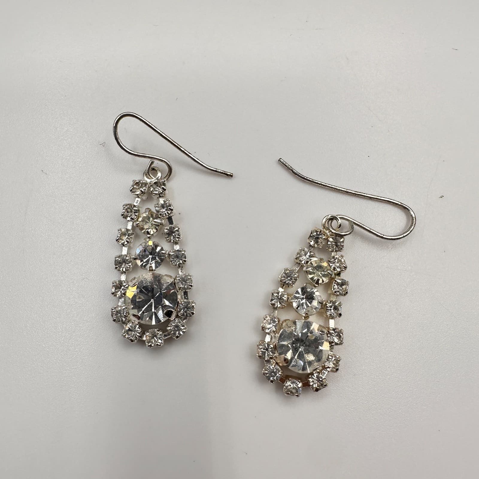 Vintage 90s Silver Tone Clear Glass Rhinestone Teardrop Dangle Hook Earrings - Image 1