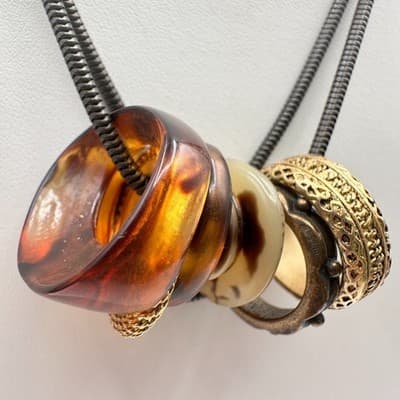 Vintage 90s Black Cord Necklace Tortoise Shell Resin & Gold Tone Ring Charms - Image 1