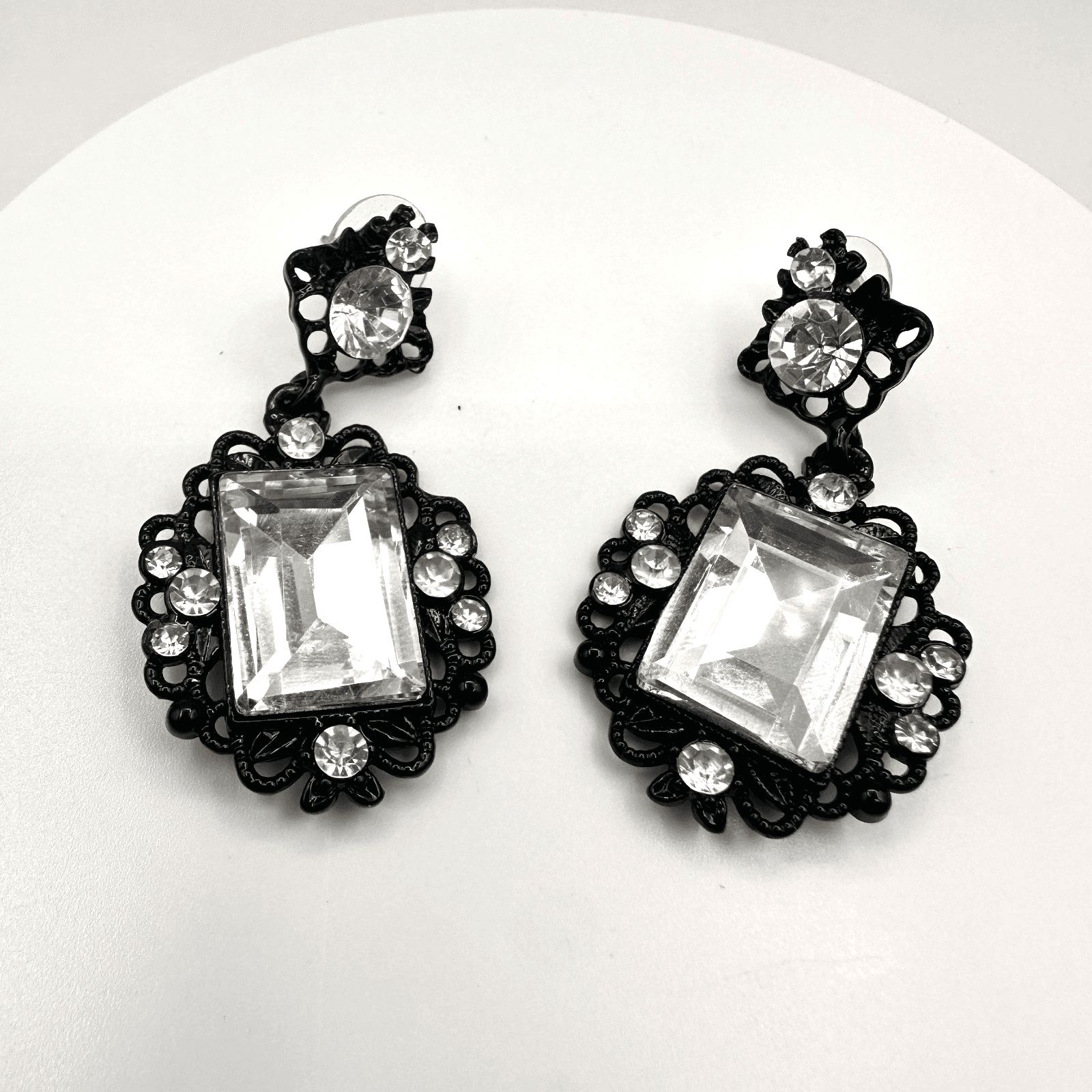 Vintage 80s Faceted Clear Crystal Stone Drop Stud Earrings Black Tone Jewelry - Image 1