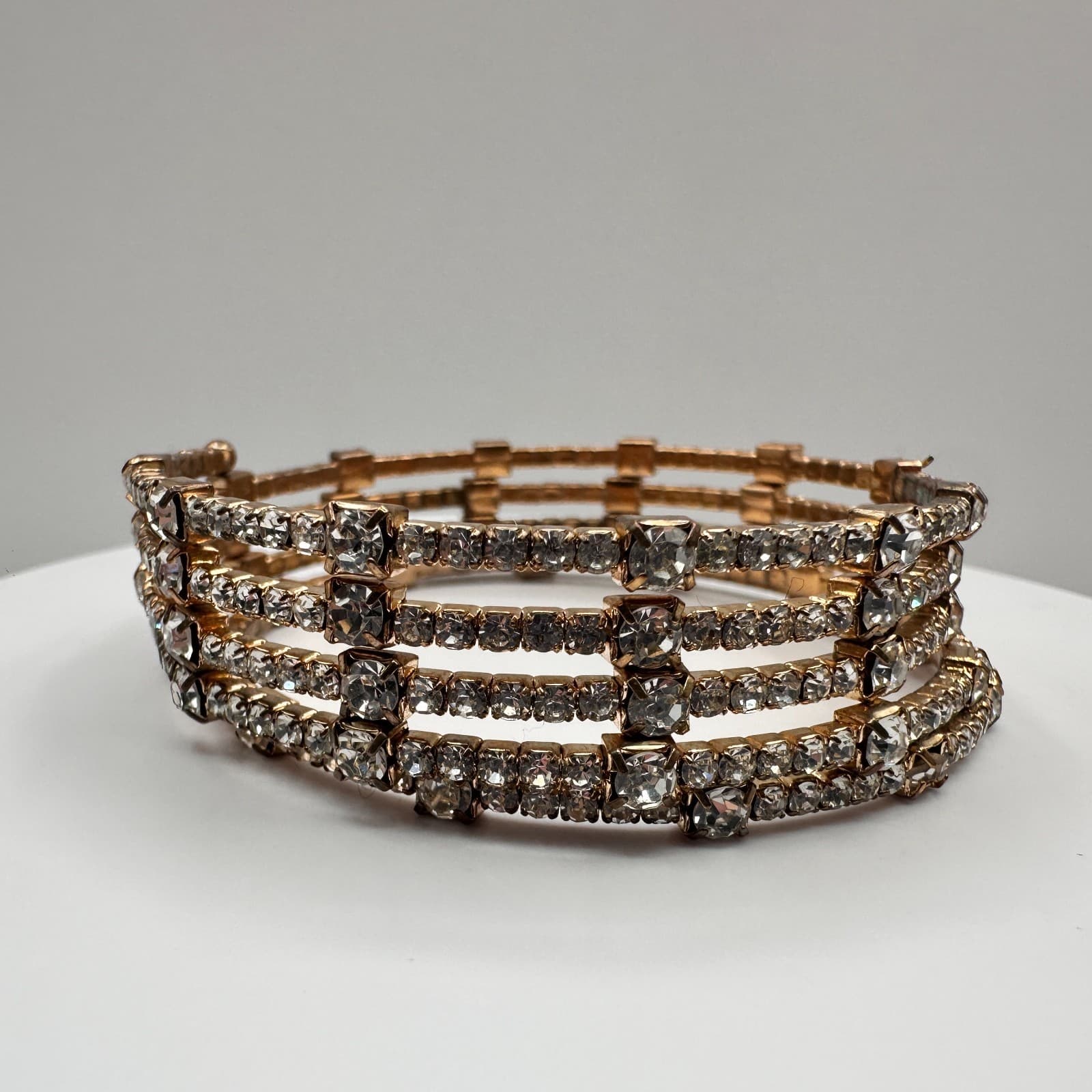 Vintage 60s 70s Gold Tone 4-Row Rhinestone Coil Wrap Bracelet Mid-Century Style - Image 1