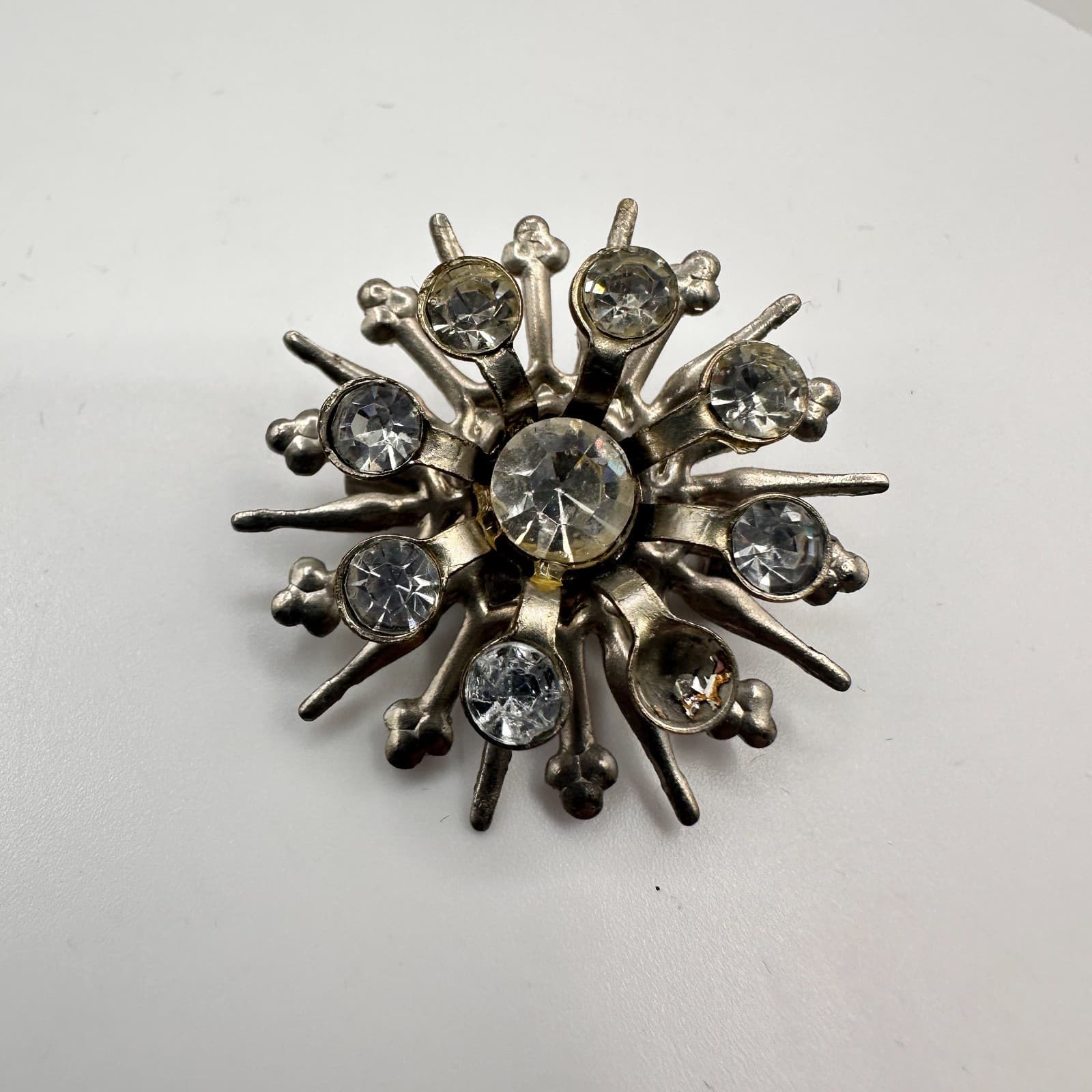 Vintage 90s Starburst Brooch Pin Silver tone Clear Rhinestone Missing Stone - Image 1