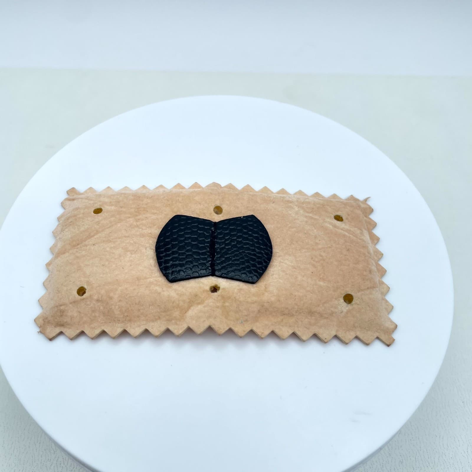 Modern Beige Classic Formal Chevron Border Black Bow Detail Leather Brooch - Image 1