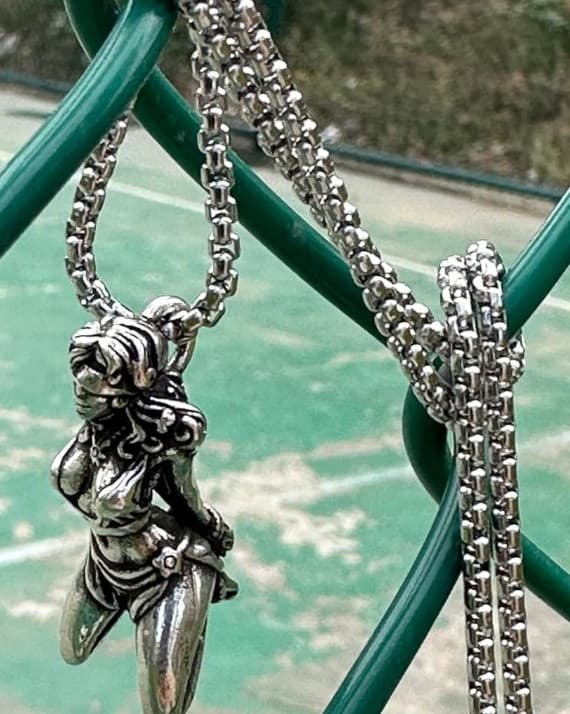 Elegant Sterling Silver Suffering Goddess Pendant - Image 1