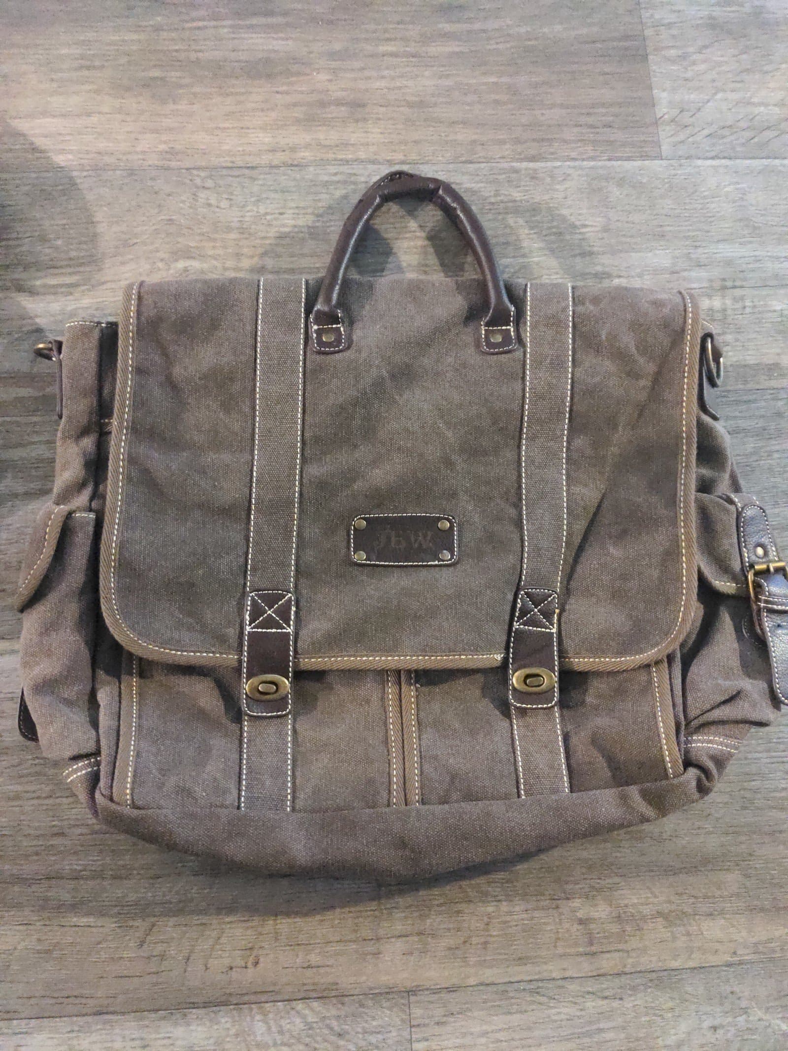 Dark brown traveling tote with multiple compartments - Image 1